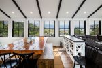 Dining table between living room and kitchen